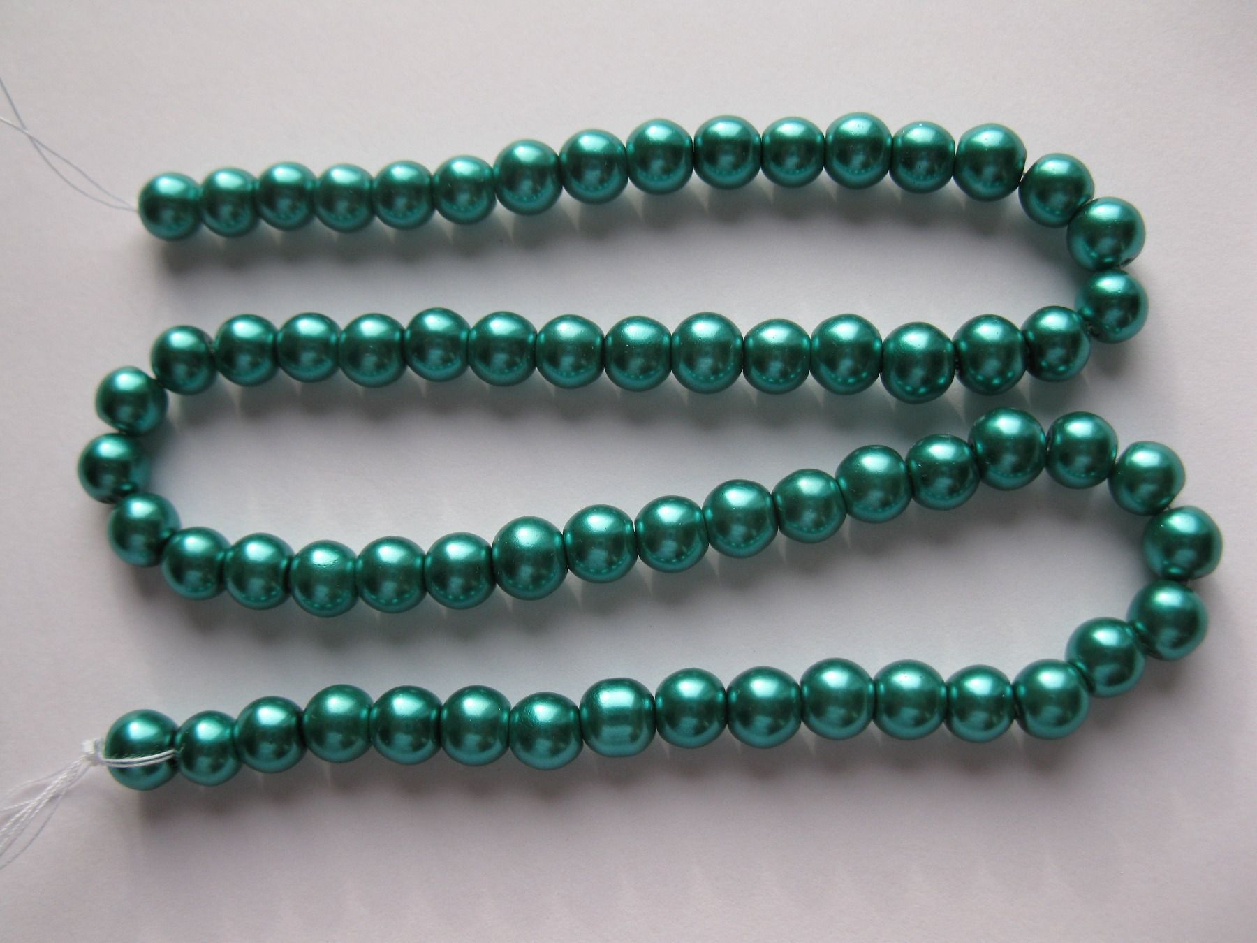 Perle (finte): 1 Strang Glasperlen Perlmutt 6mm, petrol – Nuovo e nell'imballaggio originale da St. Margarethen TG venduto da LuanaKa