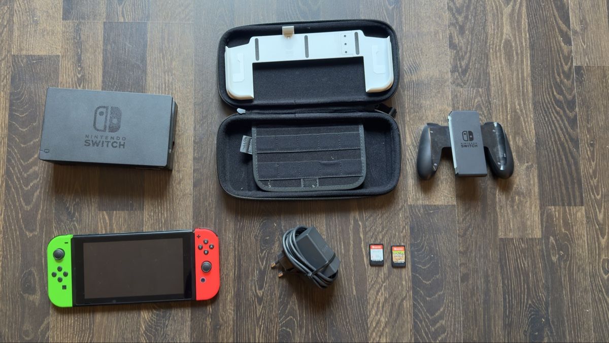 Interrupteurs: Nintendo Switch Set + Spiele und Controller – D'occasion à Richterswil par xu32