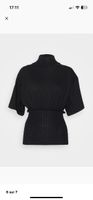 MM6, Maison Martin Margiela: Pull noir élégant à col roulé