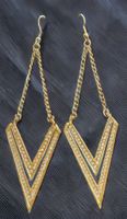 Orecchini pendenti dorati con strass 
