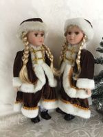 2 ältere Porzellanpuppen