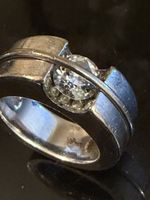 Bague haute joaillerie or blanc 750 avec diamant central 