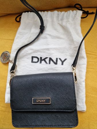 Sac DKNY noir élégant, parfait pour le printemps!