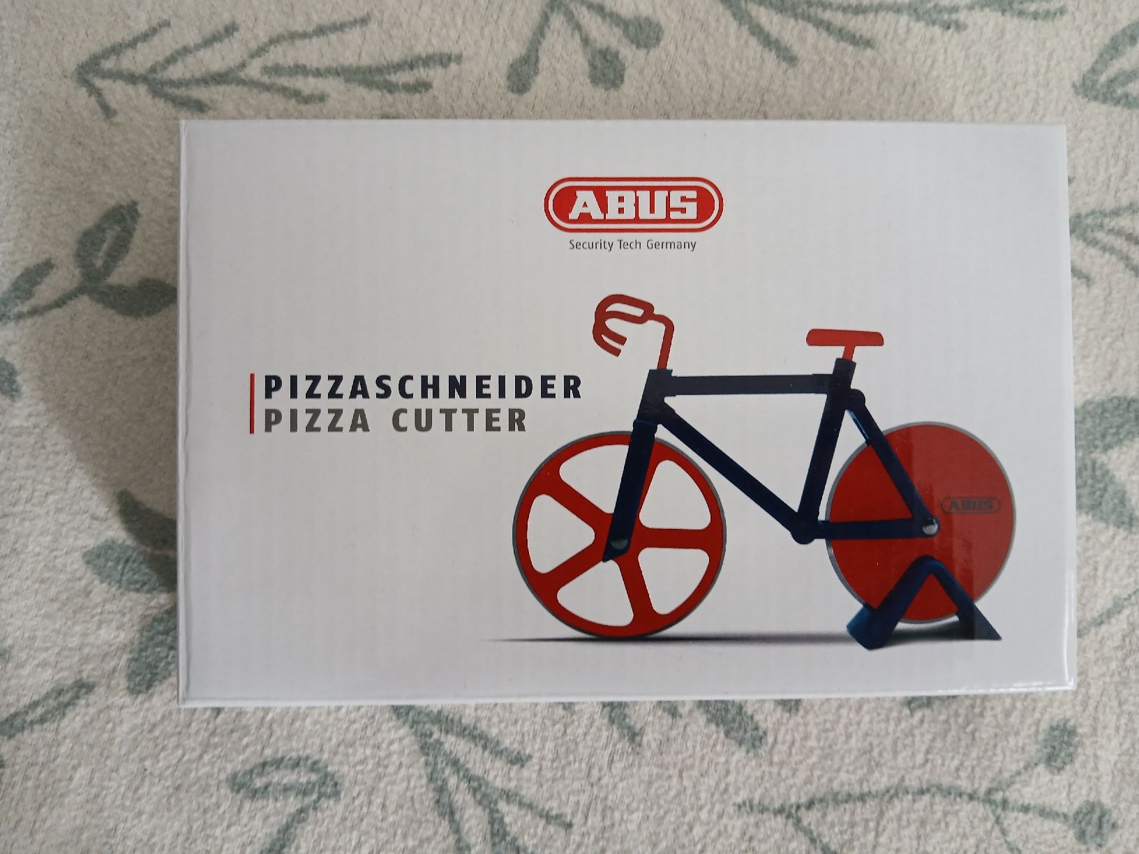 Elettrodomestici da cucina: Pizzaschneider Velo/Fahrrad von ABUS – Nuovo e nell'imballaggio originale da Langendorf venduto da bine9
