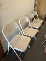 4 Klappstühle aus Metall