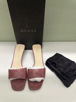 Gucci GG-embossed leather slide sandals 39