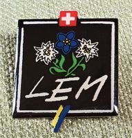 E560 - Pin Schweiz LEM Eddelweiss Enzian