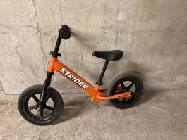 Draisienne Strider orange