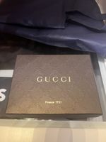 Portafoglio bi-fold Gucci in pelle marrone vintage