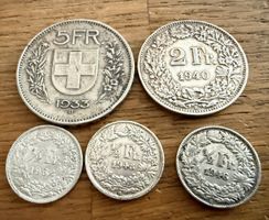 Schweizer MÜNZEN 5 Fr, 2 Fr, 3x 1/2  Silbermünzen