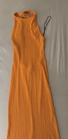 Robe moulante orange sans manches taille S bon état