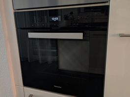 Miele Einbaubackofen H 6460-60BP SW
