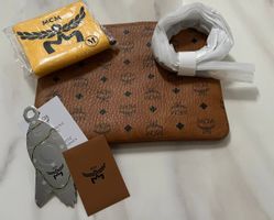 MCM Umhängepouch In Visetos Original, cognac