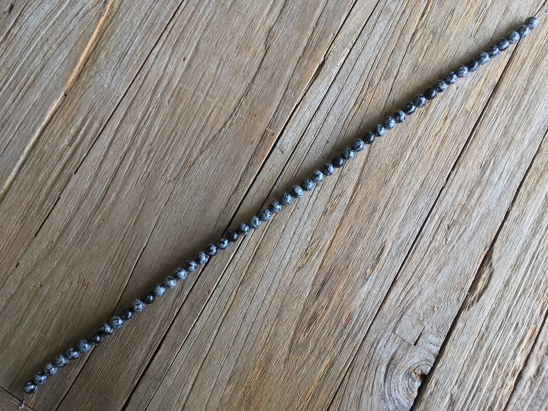 Catenine: SCHNEEFLOCKENOBSIDIAN  KUGELN 8mm LÄNGE 40cm – Nuovo e nell'imballaggio originale da Aesch ZH venduto da LiquidAktion 5