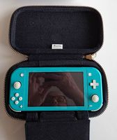 Nintendo Switch Lite Türkis + Zelda-Tasche  guter Zustand
