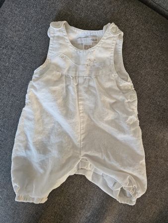 H&M Baby Strampler ärmellos Gr. 50/0-1M Weiss
