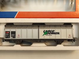 Schiebewandwagen Hbbills "Cargo Domizil" der SBB von Roco H0