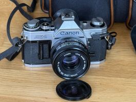 Canon AE-1 + FD 50mm 1:1.8 + Data Back + Blitz + Tasche