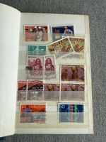 Album mit Helvetia Briefmarken