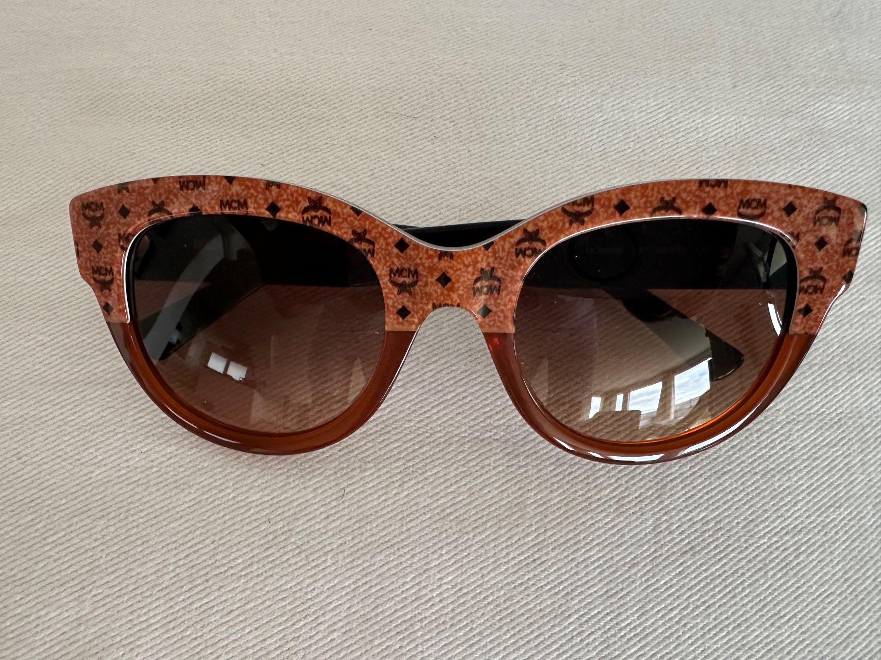 Mcm Occhiali & Lenti: Sonnenbrille MCM braun mit Logo Muster – Usato da Altendorf venduto da davos_7270
