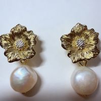 Boucles d'oreilles élégantes avec perles