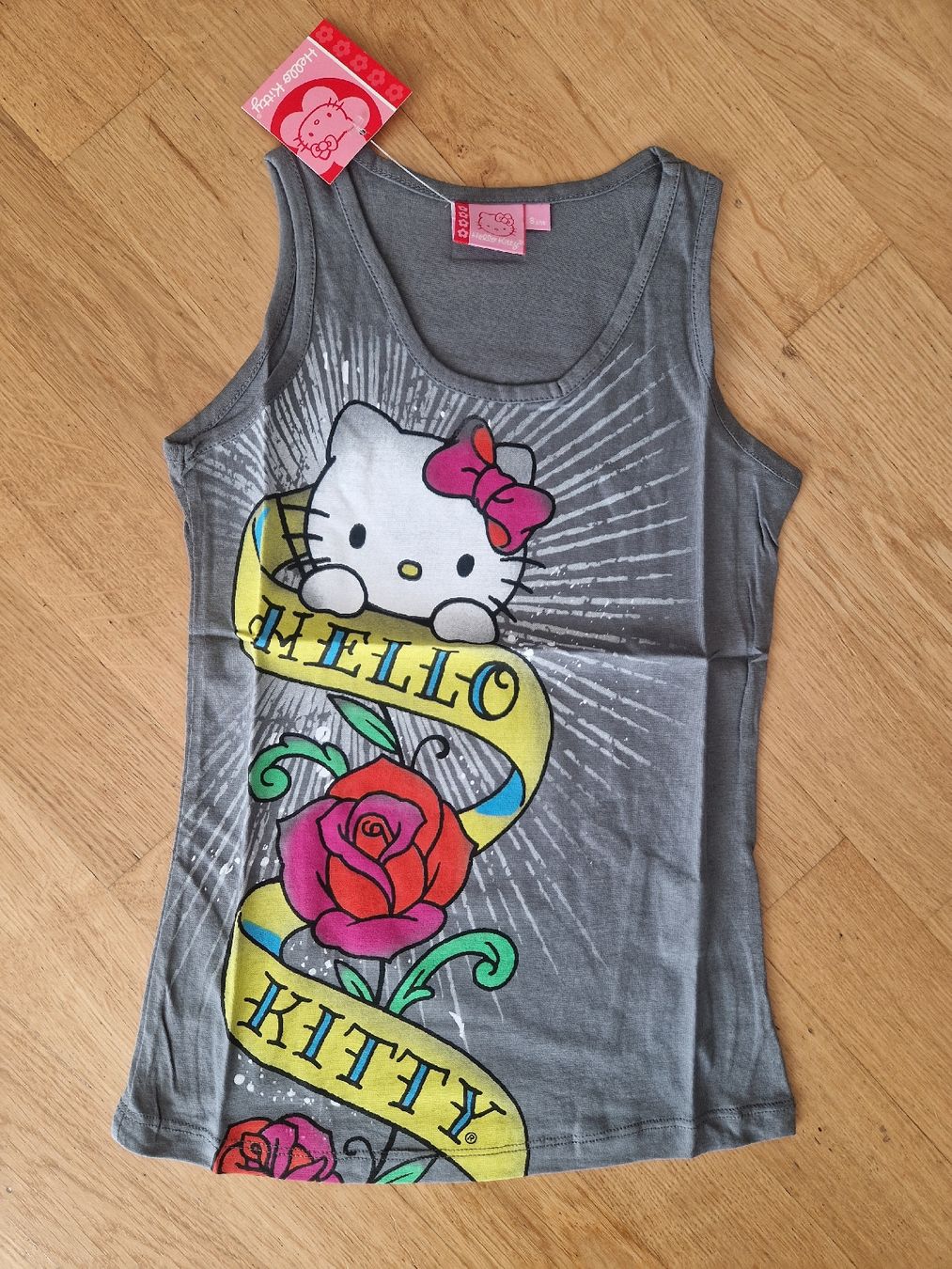 Camicette, T-shirt & Top: Débardeur Hello Kitty, taille 8 ans neuf, été chic! – Nuovo e nell'imballaggio originale da Penthaz venduto da Sosotroc