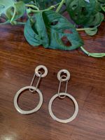 Boucles d'oreilles pendantes dorées