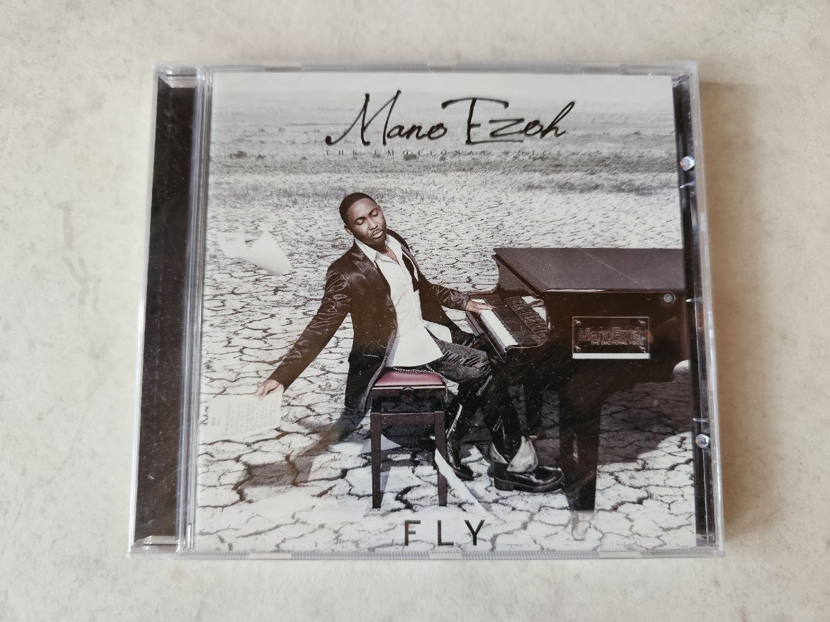 CD: Mano Ezoh  -  Fly  /  Fabrikneu – Nuovo e nell'imballaggio originale da Schneisingen venduto da backstore24