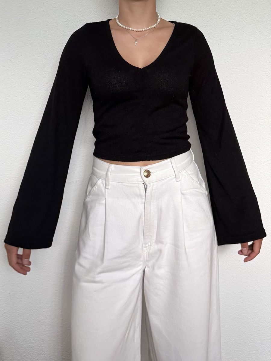 H&M Top: SCHWARZES LANGARMSHIRT VON H&M – Usato da Rain venduto da vsekruto