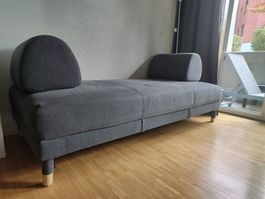 Grey couch with storage space