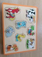 Holzpuzzle Tiere