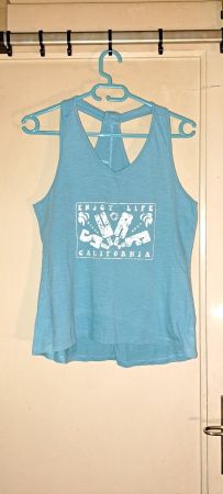 Débardeur style surf bleu turquoise