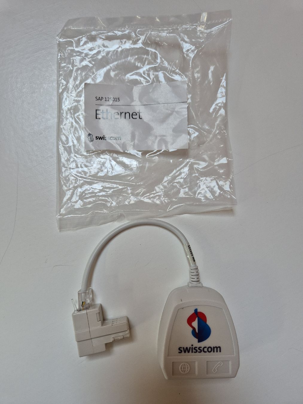 Unità & Adattatore: Swisscom Ethernet-Adapter, neu und originalverpackt – Nuovo (secondo la descrizione) da Goldach venduto da nikkaaa