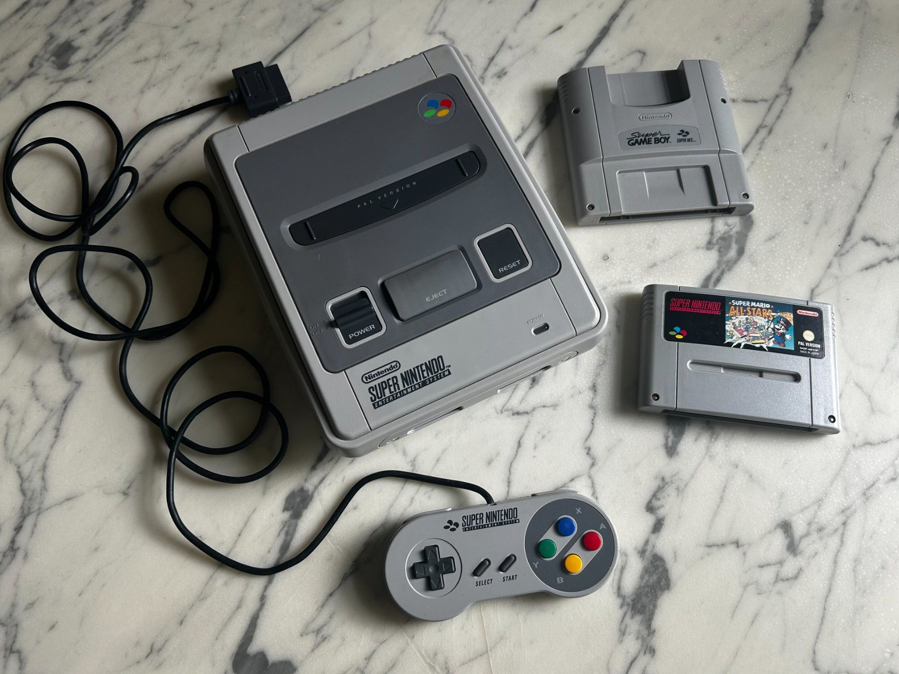 Nintendo Console: Nintendo SNES Bundle mit Controller und Mario Spiel – Usato da St. Gallen venduto da lis_cd6d