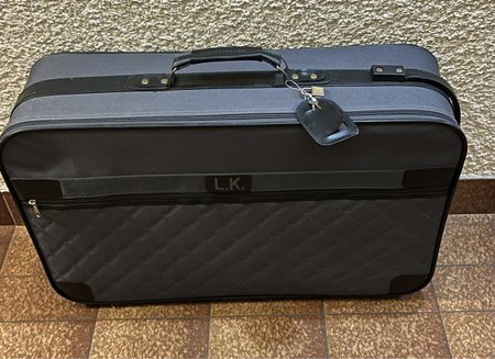 Valise à roulettes spacieuse et robuste, idéale voyage!