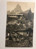 Alte Ansichtskarte Braunwaldalp mit Berg und zwei Kühen