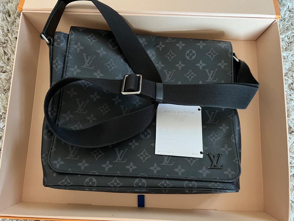 Louis Vuitton Messenger Duo en cuir avec facture