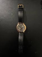 Montre en excellent état proche du neuf