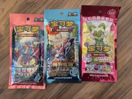 Pokémon China-Edition: 2 Coin Sets + Gem Pack Badge Set, OVP