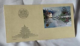 Seidencouvert-Ersttagbrief (FDC) Schweizer World Philatelic