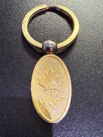 Schlüsselanhänger Kanada, in goldener Farbe, Metall