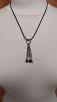 Joli collier métal sur cordon, liquidation boutique