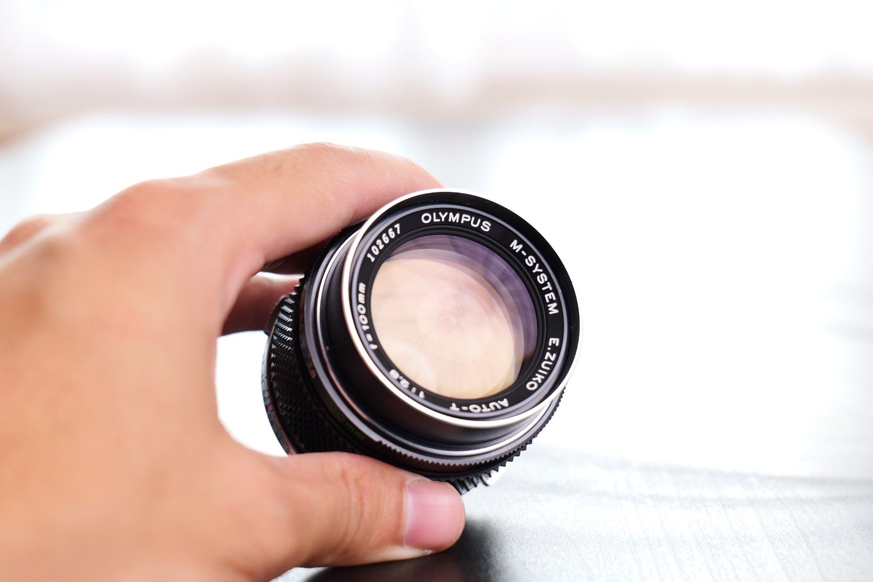 Olympus Objectifs: Olympus OM Zuiko 100mm f2.8 – D'occasion à Tecknau par LevinLaufmann 6