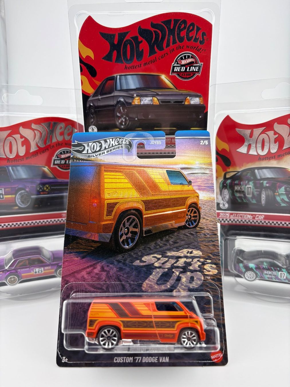Hot Wheels Modellini d'auto: Hot Wheels Custom '77 Dodge Van Surf's up - 2025 - 2/5 – Nuovo e nell'imballaggio originale da Flawil venduto da HeisseReifen
