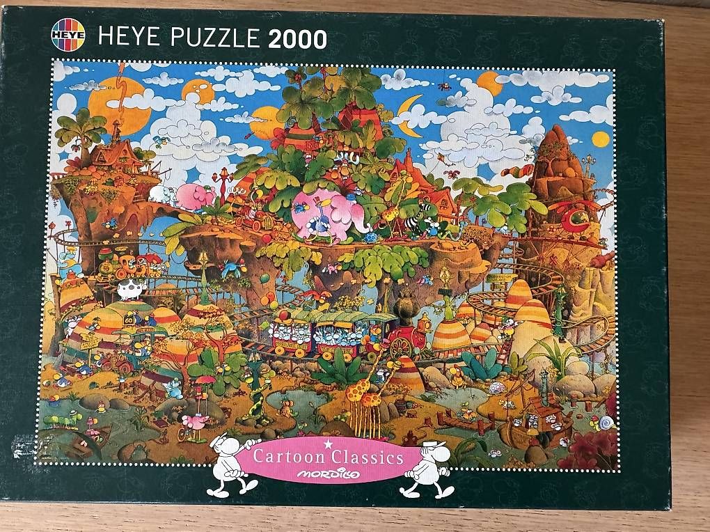 Puzzles: Puzzle Mordillo Train 2000 Teile – Gebraucht aus Wettswil von artiana56