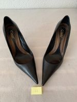 Schwarze neuwertige High Heels   . 67