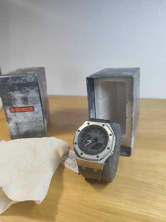 Casio Orologi: CasiOak Mod - Montre Casio G-Shock GA-2100 Custom Noir – Nuovo e nell'imballaggio originale da Vétroz venduto da mrcl01 1
