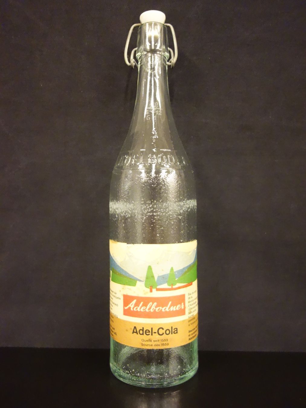 Verres, cruches & bouteilles: alte Flasche ADELBODNER ADEL - COLA 1961 – D'occasion à Kerzers par Flaschenposten