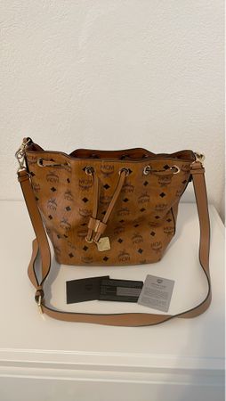 MCM Beuteltasche braun Logo Muster gebraucht