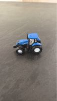 Siku1012 Traktor New Holland blau guter Zustand